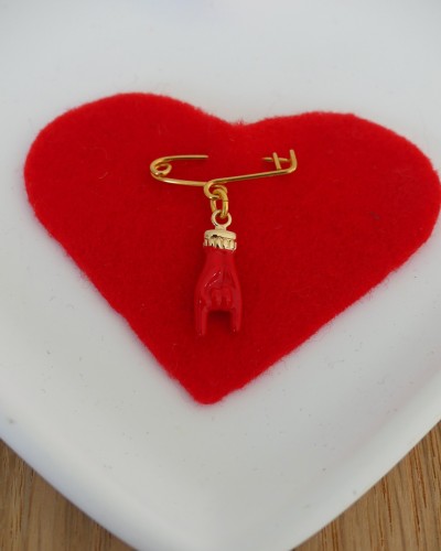 Broche rouge